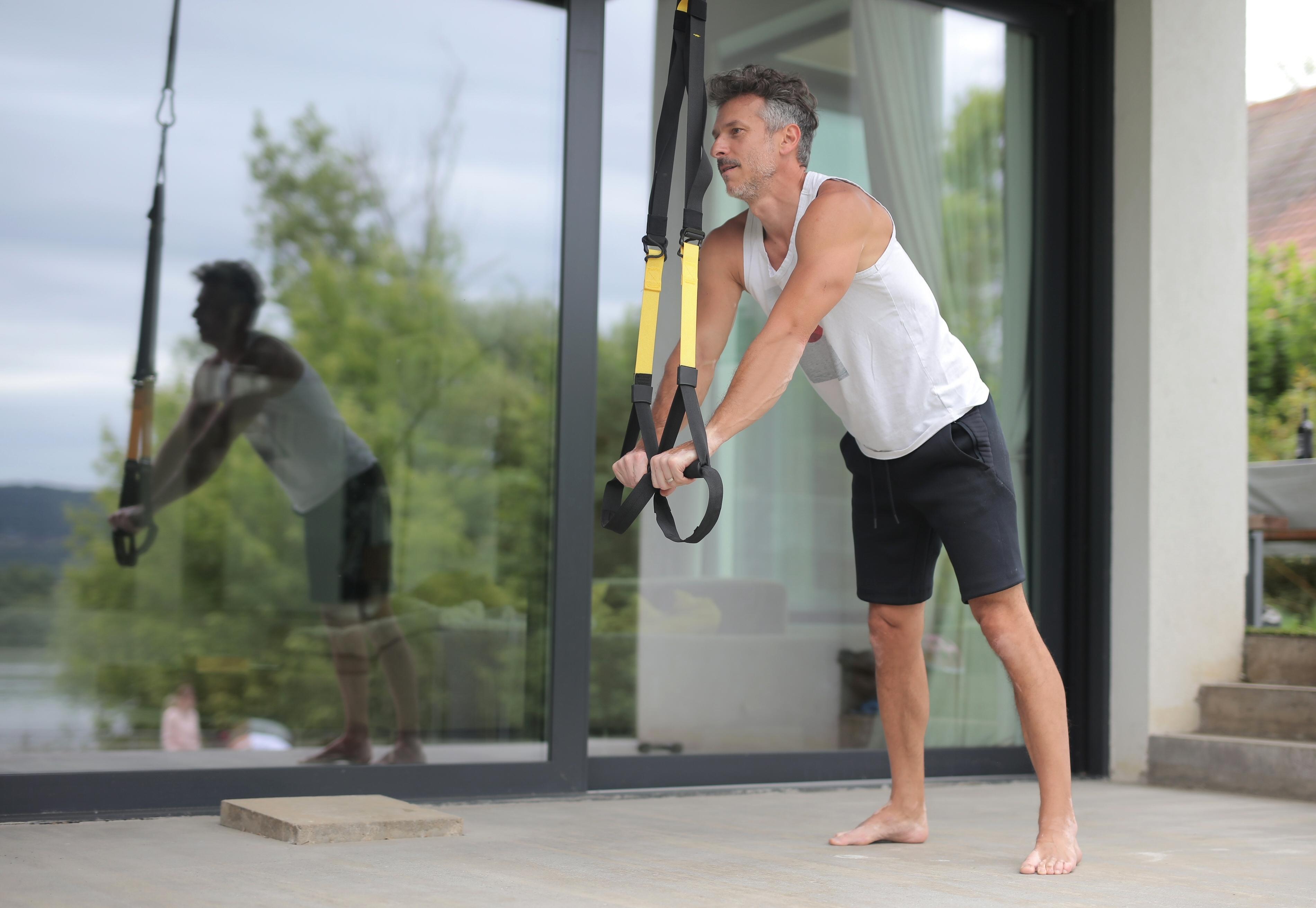 Squat with Confidence Using TRX for Ultimate Stability